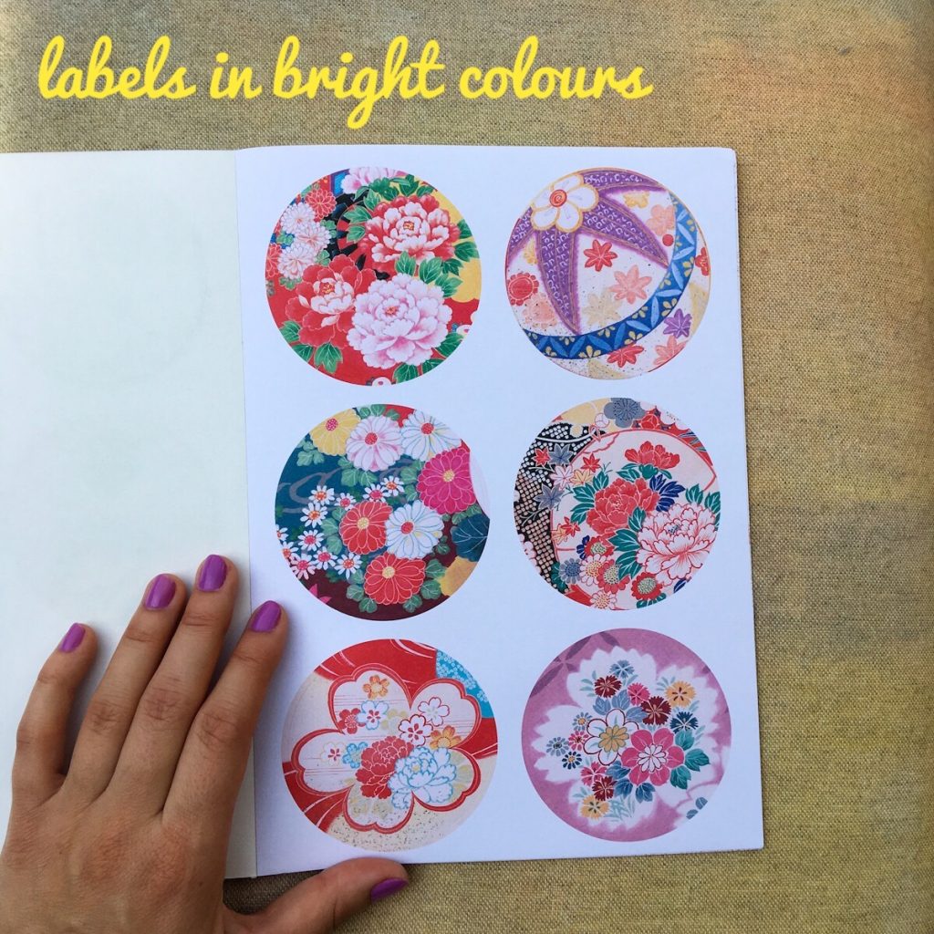 labels in bright colours with the design of sakura cherry blossoms